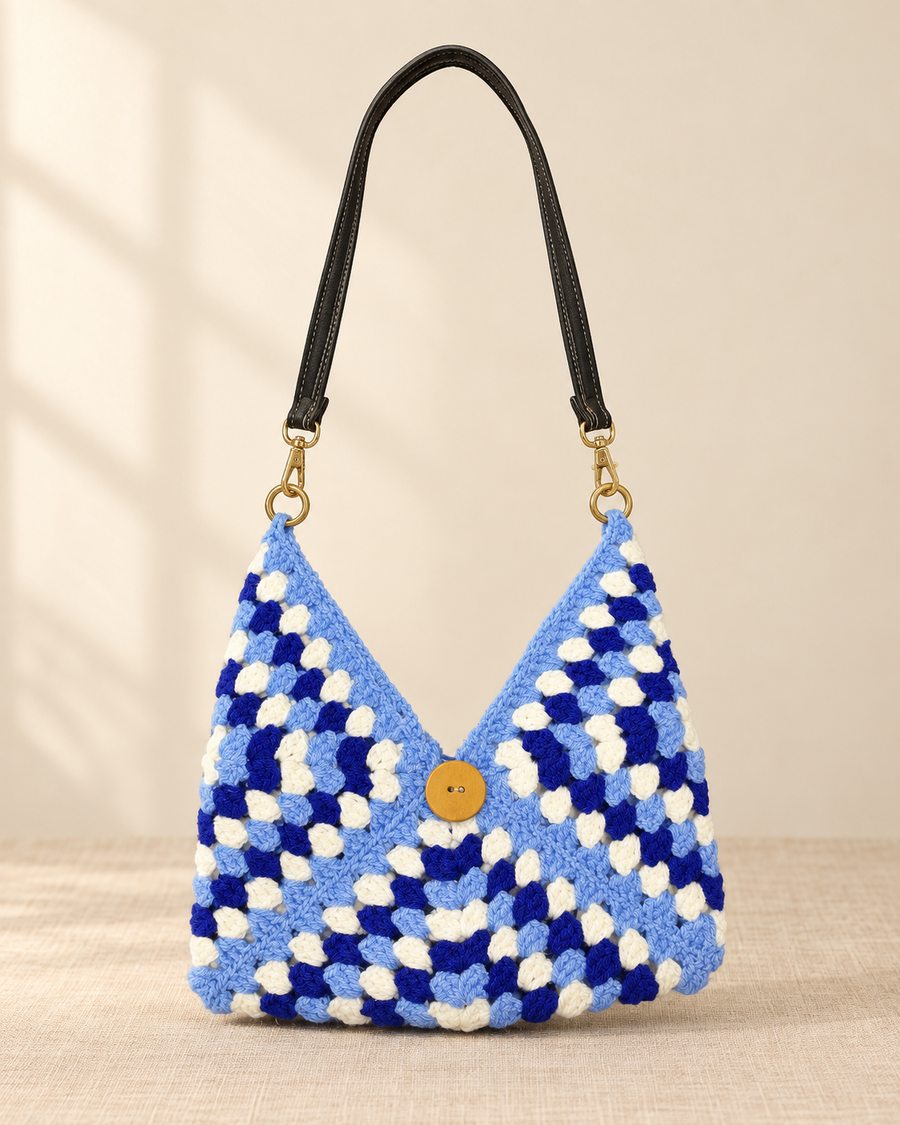 Blue, white and light-blue handmade crochet shoulder bag with black strap