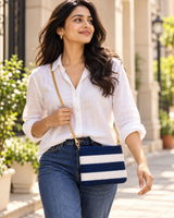 Navy & White Striped Chain Sling Bag — model carrying the bag