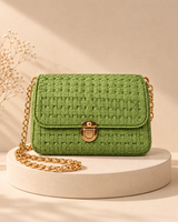 Woven Flap Chain Sling Bag — Green — warm beige pedestal product photo