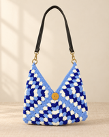 Blue, white and light-blue handmade crochet shoulder bag with black strap