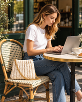 Cloud Knit Shoulder Bag lifestyle photo — gold chain resting naturally on chair