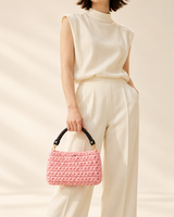 Everyday Shoulder Bag – Pink — model holding the bag