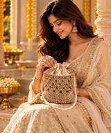 Gold Lace Potli with model wearing traditional Indian outfit