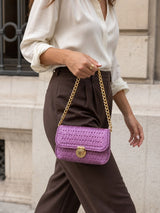 Mauve Elegance Flap Bag carried on shoulder