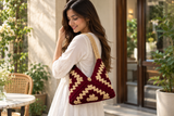 Mosaic Purse Maroon carried by model, revised lifestyle image