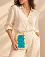 Ocean Mist Mobile Sling — model holding the bag
